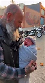 Biker Finds Abandoned Baby in Tesla