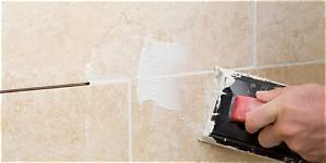 Do You Grout Tile Against the Wall?