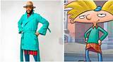 Ebuka Sports Blue Trench Coat, Brown Fedora Hat as He Dresses up as 90S Cartoon Character