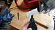 How to Attach Sandpaper to a Dremel