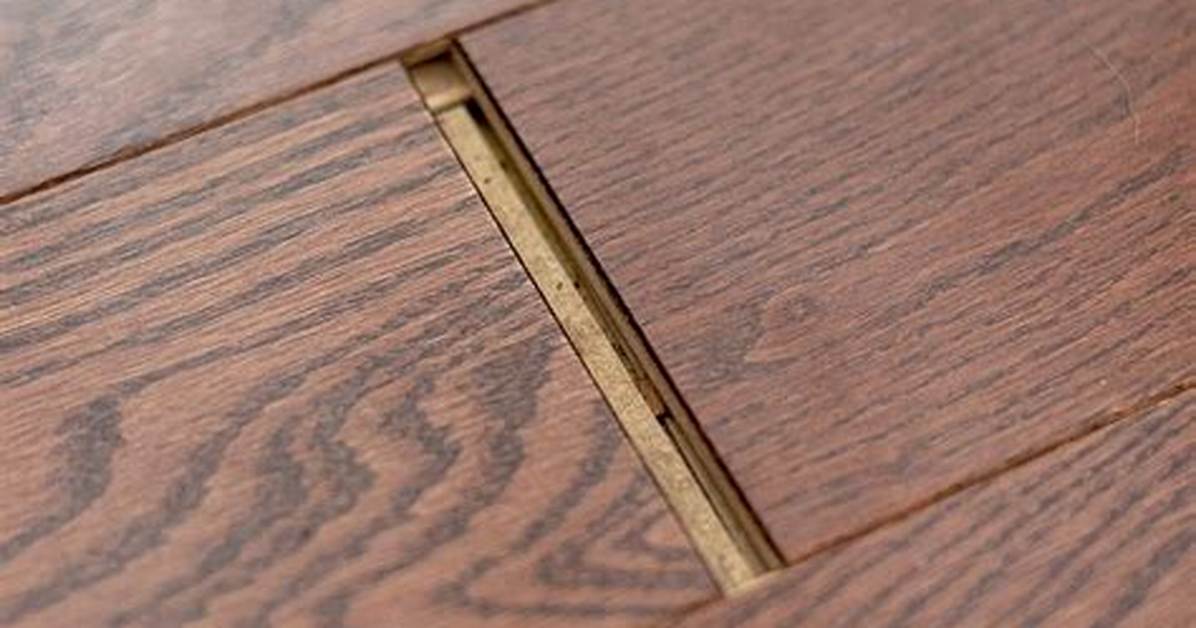 How to Close the Gap Between Wood Stairs & a Wall