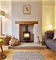 How to Decorate Around a Wood-Burning Stove
