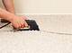 How to Glue Down Carpet Bubbles