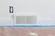 How to Install Baseboards Around Air Vents on a Wall