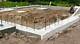 How to Pour Footings for a Block Wall