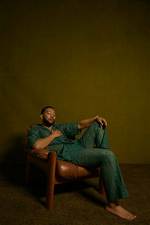 John Legend's Barefoot Journey: a Unique Perspective on Music and Lifestyle