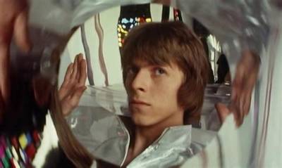 Meaning of Space Junk by David Bowie