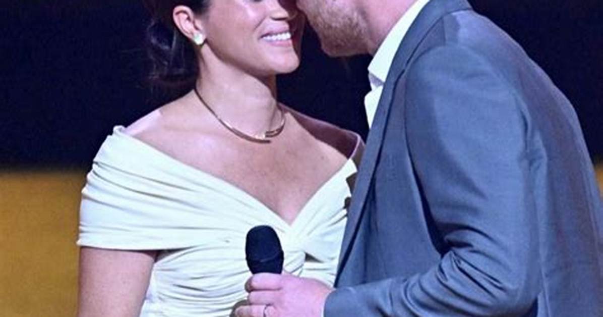 Meghan Markle Kisses Prince Harry During Glamorous Polo