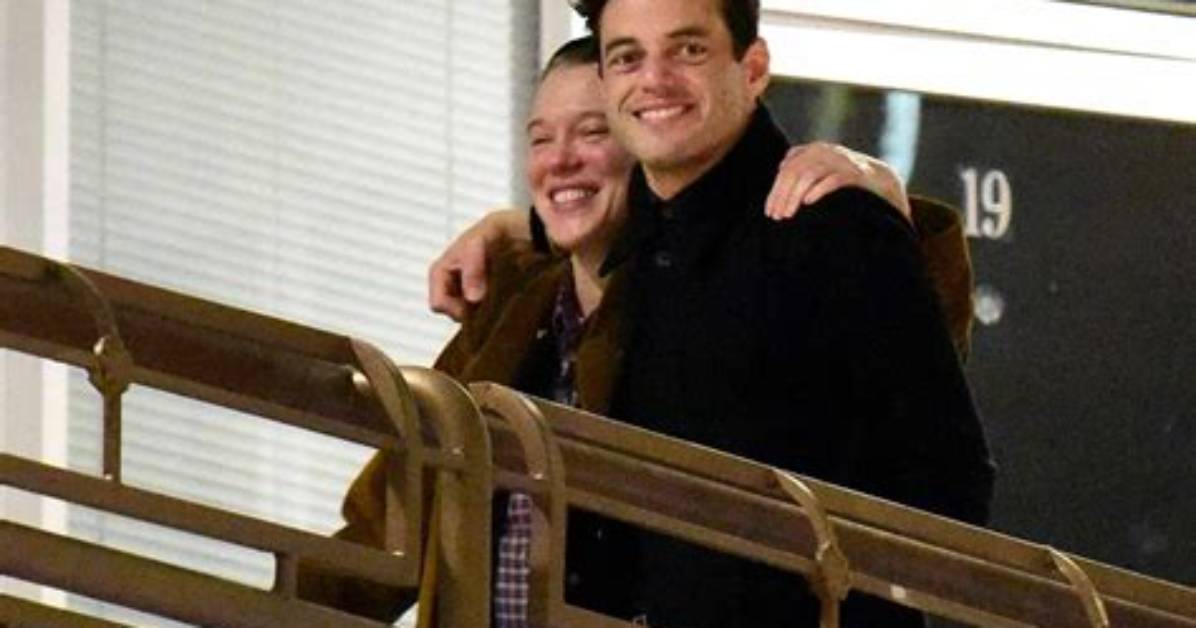 Rami Malek and Lea Seydoux Smile as They Walk with Their Arms Around