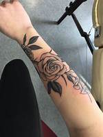 Rose Wrapped Around Arm Tattoo: a Timeless Symbol of Beauty and Strength