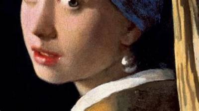 The Meaning of " "Woman with a Pearl Necklace by Johannes Vermeer