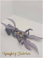 Tiny Tixie: Unveiling the World of Miniature Art and Collectibles