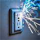What Causes an Electric Outlet to Spark When You Plug in an Appliance?