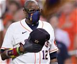 Why Does Dusty Baker Wear Gloves and Mask?